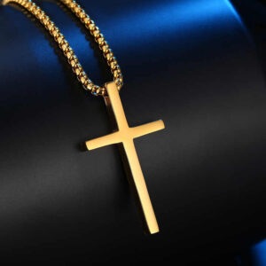 Long Cross Necklace displayed on a neutral background, emphasizing its timeless appeal.